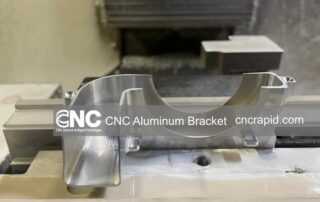 Custom CNC machined aluminum bracket freshly milled from billet before finishing
