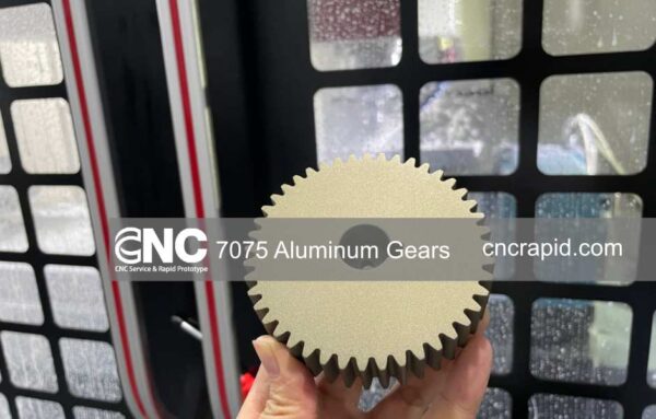 Precision CNC machined 7075 aluminum pinion gear with keyway and Type III hard anodized finish