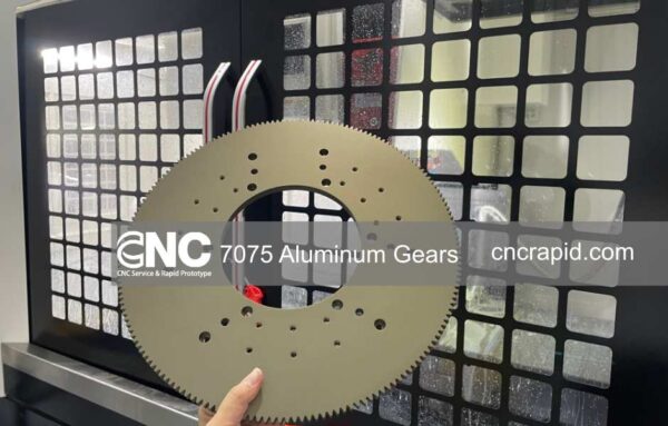 Large-diameter 7075 aluminum ring gear with precision holes, CNC machined and hard anodized by CNC Rapid