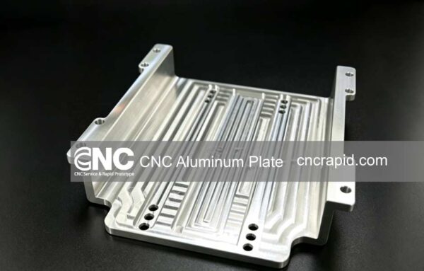 CNC machined aluminum structural plate with ribbed pockets and mounting feet, produced in volume by CNC Rapid